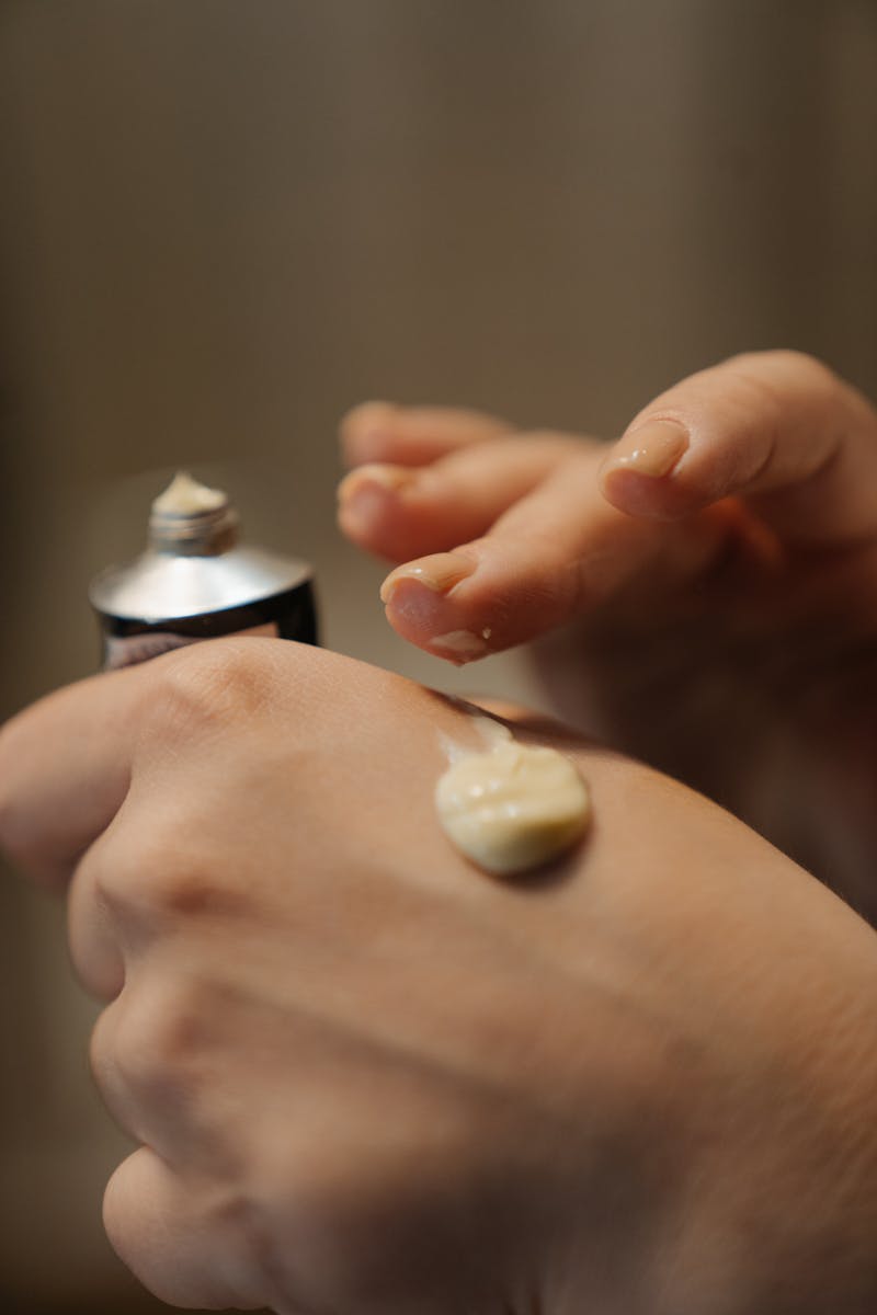 Person Holding White Round Ornament